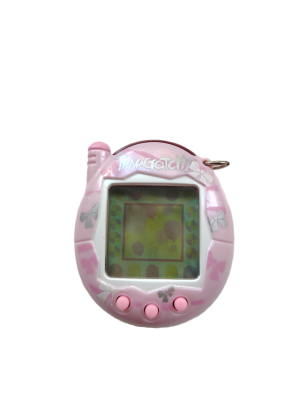 Tamagotchi Version 3, pink with ribbons